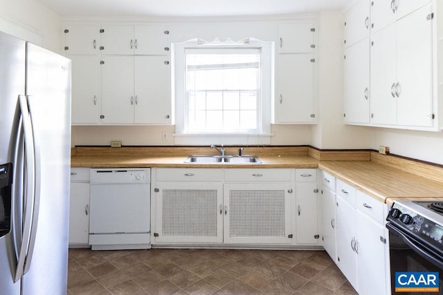 2201 Stadium Rd, Charlottesville, VA 22903 - kitchen with stainless steel fridge with ice dispenser, black electric range, white dishwasher, white cabinetry, and light countertops