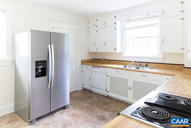 2201 Stadium Rd, Charlottesville, VA 22903 - kitchen with stainless steel fridge with ice dispenser, dishwasher, white cabinetry, light countertops, and stovetop with downdraft