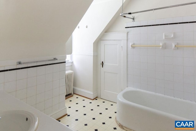 2201 Stadium Rd, Charlottesville, VA 22903 - full bathroom featuring radiator, vanity, and tile patterned flooring