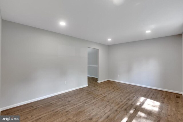 11808 Rutherford Dr, Fredericksburg, VA 22407 - unfurnished living room with light wood-type flooring, recessed lighting, and a fireplace