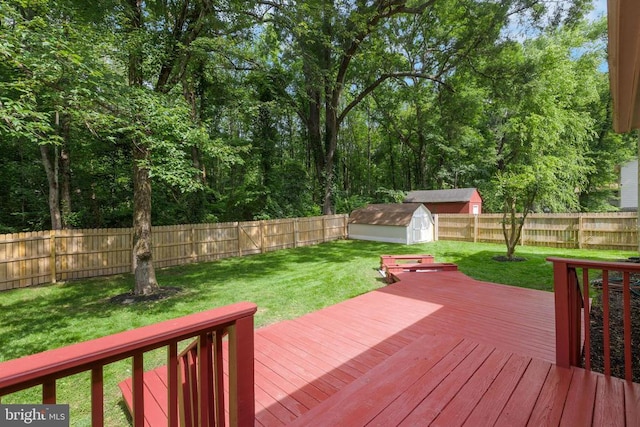 11808 Rutherford Dr, Fredericksburg, VA 22407 - deck featuring a fenced backyard and a storage unit