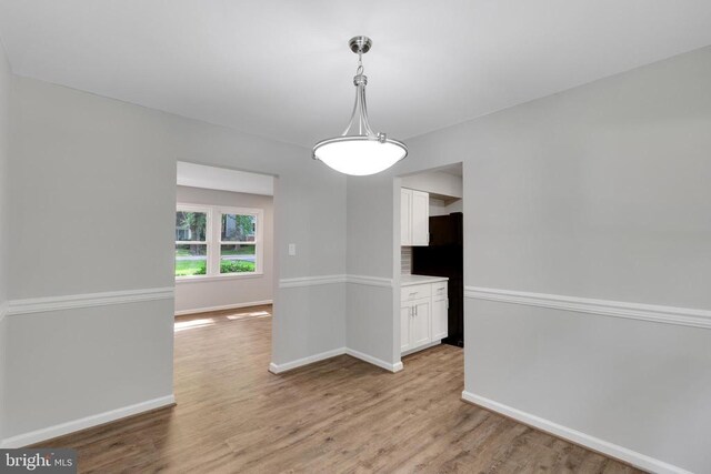 11808 Rutherford Dr, Fredericksburg, VA 22407 - unfurnished living room featuring light wood-style flooring and recessed lighting