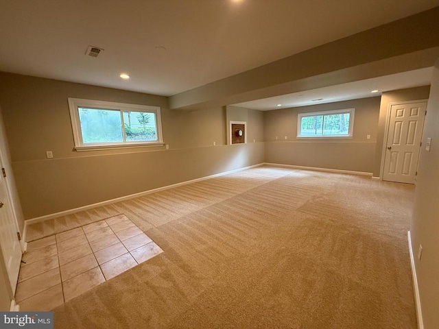 11503 Wilderness Park Dr, Spotsylvania, VA 22551 - spare room featuring light carpet, recessed lighting, baseboards, and light tile patterned floors