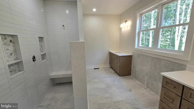 4120 Cabin Rd, Reva, VA 22735 - full bathroom with vanity, walk in shower, tile walls, and recessed lighting