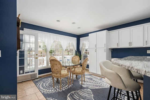 604 Mt Pleasant Dr, Locust Grove, VA 22508 - dining space with light tile patterned floors and recessed lighting