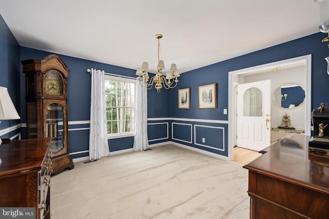 604 Mt Pleasant Dr, Locust Grove, VA 22508 - carpeted dining area with a chandelier and a wainscoted wall