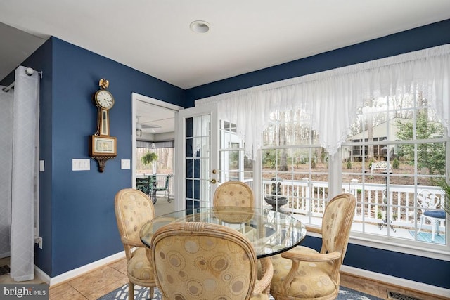 604 Mt Pleasant Dr, Locust Grove, VA 22508 - dining area featuring tile patterned flooring and baseboards