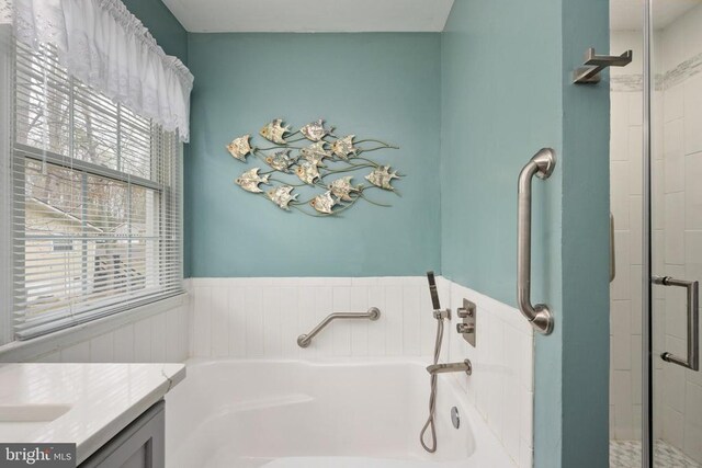 604 Mt Pleasant Dr, Locust Grove, VA 22508 - full bath featuring a shower stall, a garden tub, vanity, and wainscoting
