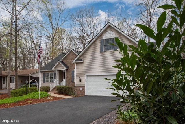 604 Mt Pleasant Dr, Locust Grove, VA 22508 - view of front facade with aphalt driveway and an attached garage