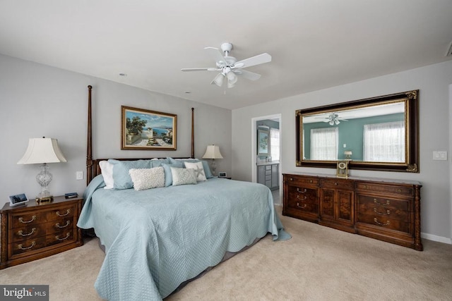 604 Mt Pleasant Dr, Locust Grove, VA 22508 - bedroom with carpet flooring, connected bathroom, and a ceiling fan