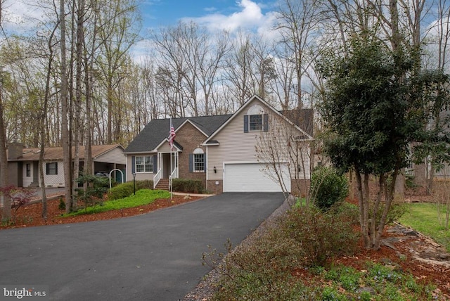 604 Mt Pleasant Dr, Locust Grove, VA 22508 - view of front of house with aphalt driveway and an attached garage