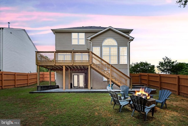 6915 Yeoman Ct, Fredericksburg, VA 22407 - rear view of house with an outdoor fire pit, a deck, stairs, and a patio area