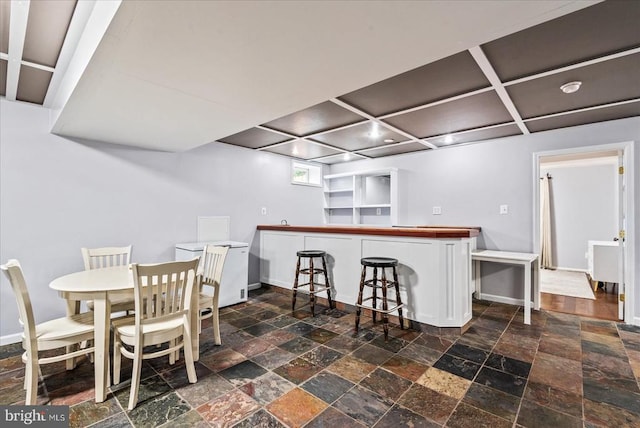 6915 Yeoman Ct, Fredericksburg, VA 22407 - kitchen featuring stone tile flooring, butcher block countertops, and baseboards