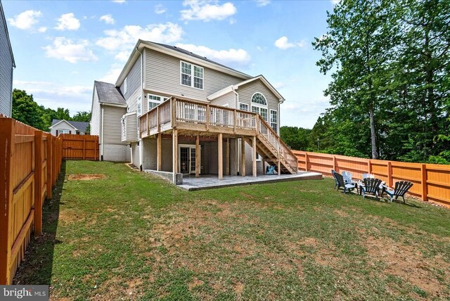 6915 Yeoman Ct, Fredericksburg, VA 22407 - back of house with a wooden deck, stairway, and a patio