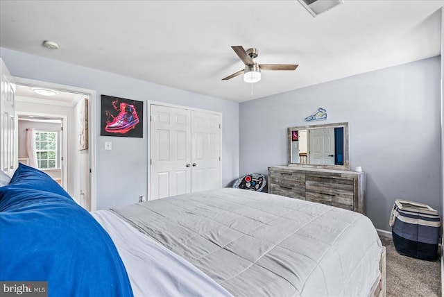 6915 Yeoman Ct, Fredericksburg, VA 22407 - bedroom with carpet, a closet, ornamental molding, ceiling fan, and baseboards
