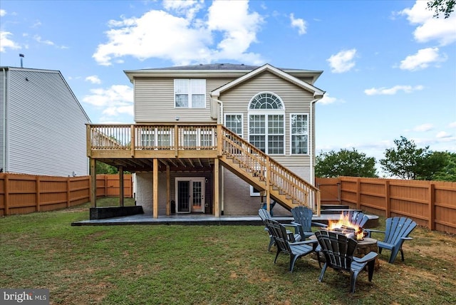 6915 Yeoman Ct, Fredericksburg, VA 22407 - back of property featuring an outdoor fire pit, a wooden deck, stairway, and a patio