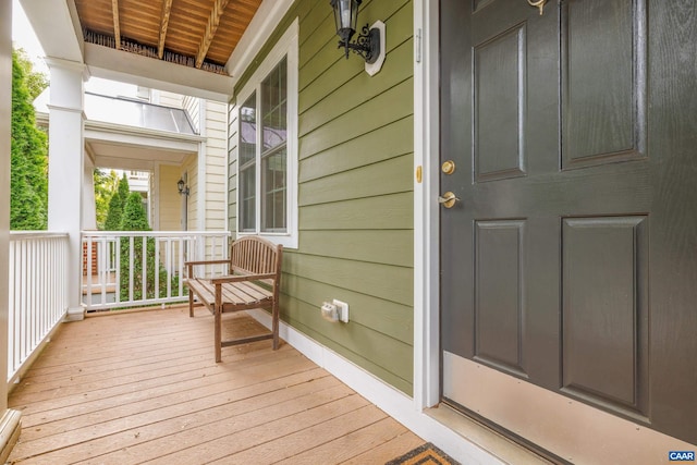 doorway to property featuring a porch
