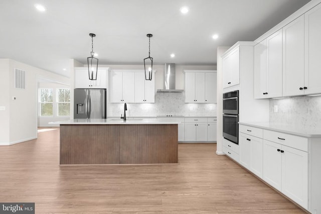 1 Blakely St, Fredericksburg, VA 22408 - kitchen with stainless steel appliances, wall chimney exhaust hood, recessed lighting, decorative backsplash, and light countertops