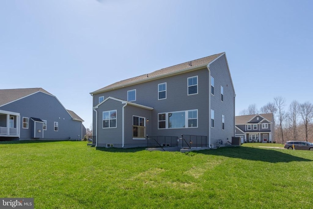 1 Blakely St, Fredericksburg, VA 22408 - rear view of house with cooling unit and a lawn