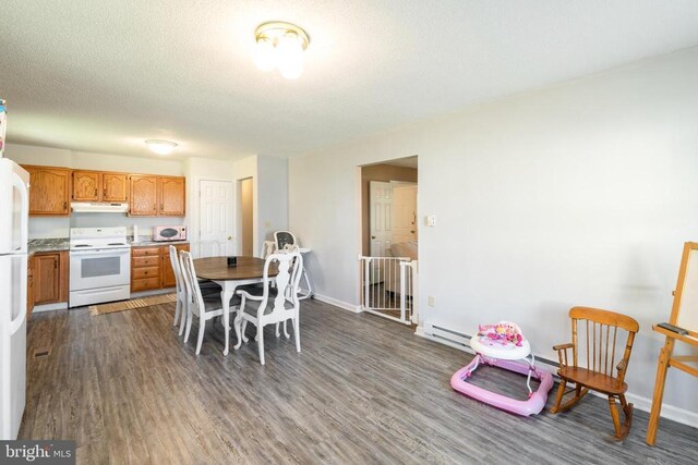 301 Charles St, Gordonsville, VA 22942 - dining space featuring dark wood-type flooring and baseboards