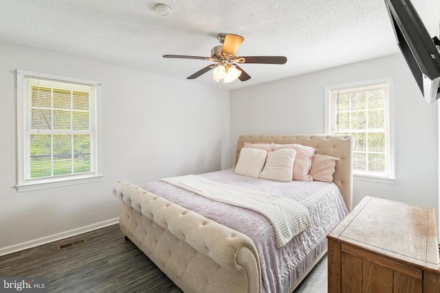 301 Charles St, Gordonsville, VA 22942 - bedroom featuring wood finished floors, baseboards, a ceiling fan, and a textured ceiling