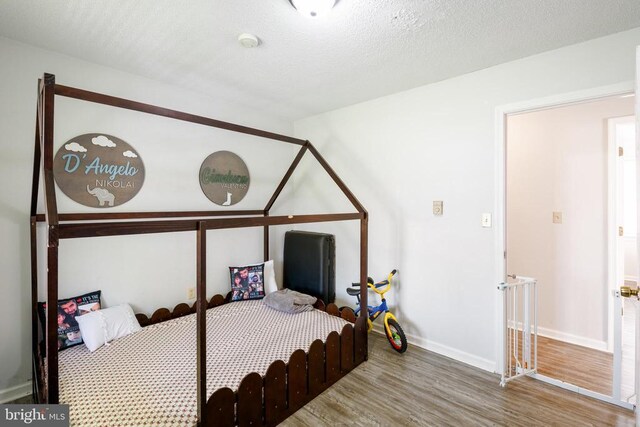 301 Charles St, Gordonsville, VA 22942 - bedroom with wood finished floors and baseboards