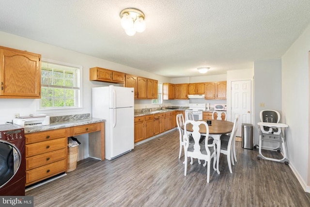 301 Charles St, Gordonsville, VA 22942 - kitchen featuring washer / clothes dryer, white appliances, dark wood-style floors, a textured ceiling, and under cabinet range hood