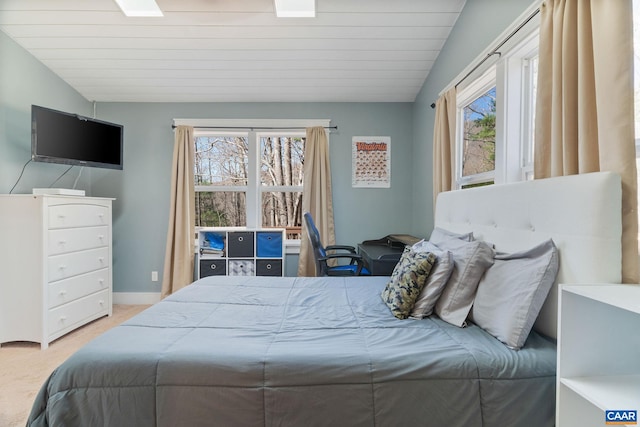 1481 Red Bird Dr, Stanardsville, VA 22973 - carpeted bedroom with vaulted ceiling and baseboards