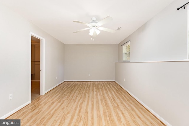 7001 Aspen Ln, Spotsylvania, VA 22551 - spare room featuring a ceiling fan, wood finished floors, and baseboards