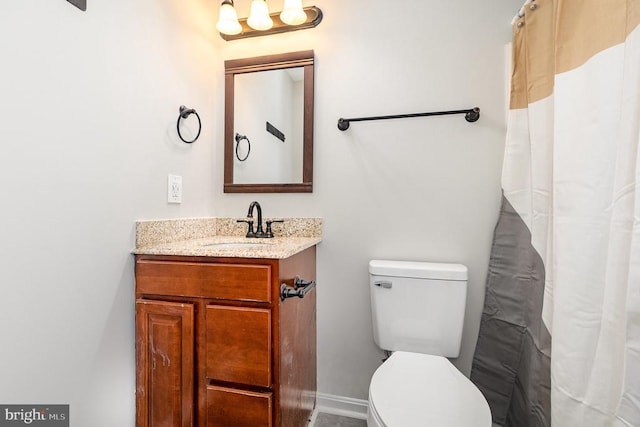 7001 Aspen Ln, Spotsylvania, VA 22551 - bathroom with vanity, toilet, and a shower with shower curtain