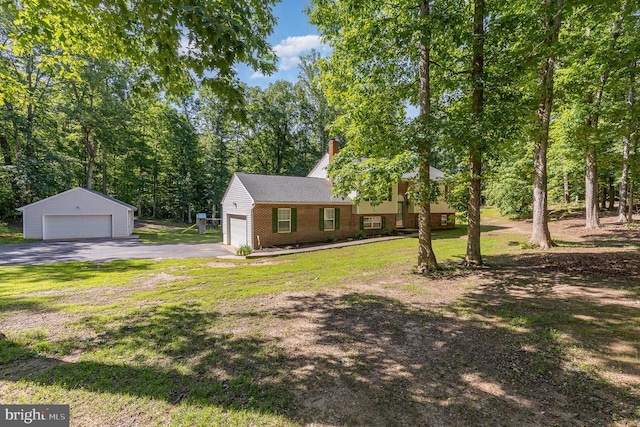 7001 Aspen Ln, Spotsylvania, VA 22551 - view of front facade with a garage, a front lawn, brick siding, and a chimney