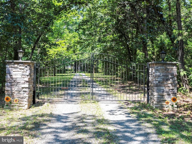  - gate featuring a forest view