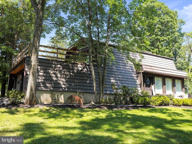  - view of front of house with a front yard