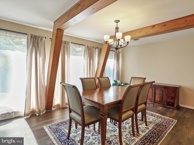 - dining space featuring a chandelier, wood finished floors, and beamed ceiling