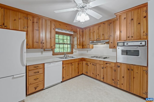 411 Westmoreland Ct, Charlottesville, VA 22901 - kitchen with white appliances, under cabinet range hood, light countertops, and ceiling fan