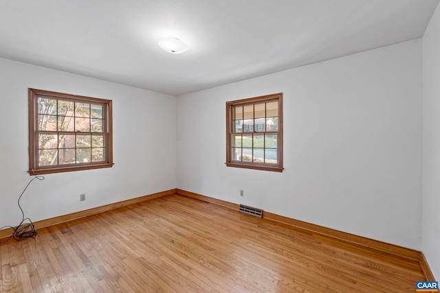411 Westmoreland Ct, Charlottesville, VA 22901 - unfurnished room with baseboards and light wood finished floors