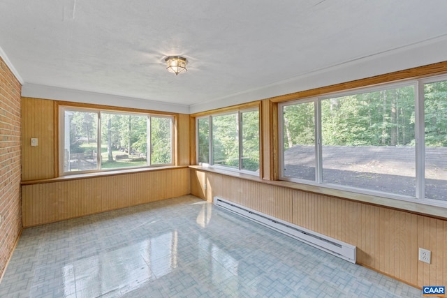 411 Westmoreland Ct, Charlottesville, VA 22901 - unfurnished sunroom with a baseboard radiator, wood walls, and brick wall