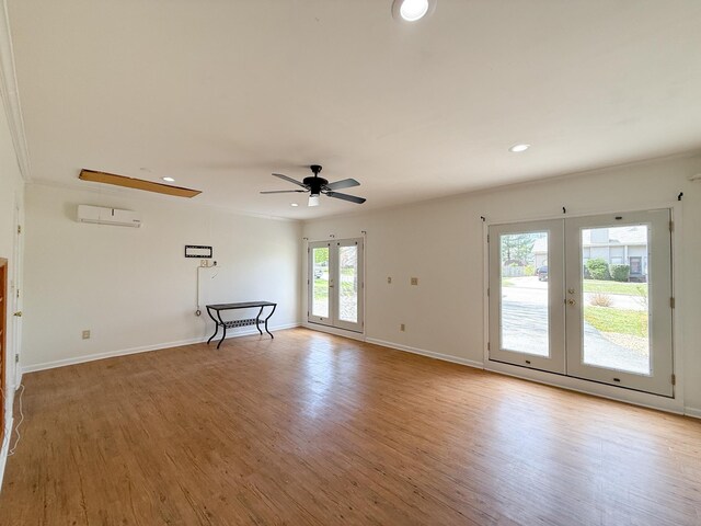 150 Falling Rock Dr, Stuarts Draft, VA 24477 - unfurnished room with french doors, light wood-type flooring, a ceiling fan, recessed lighting, and a wall mounted AC