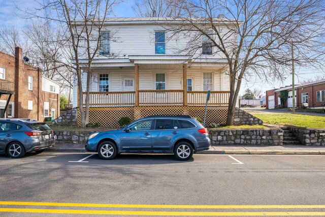 view of property with a porch