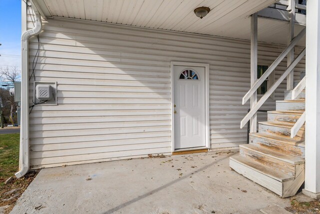 property entrance with a patio