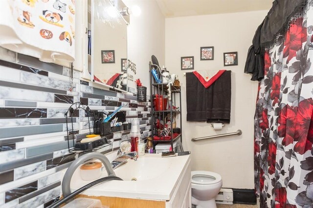 bathroom featuring vanity, toilet, and a shower with shower curtain