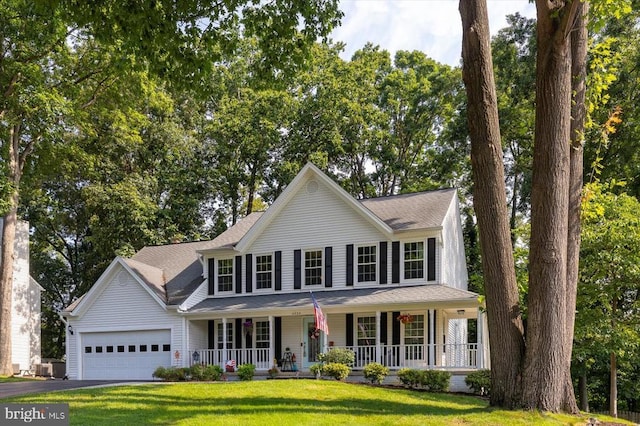 4924 Queensbury Cir, Fredericksburg, VA 22408 - colonial inspired home with covered porch, an attached garage, asphalt driveway, and a front yard