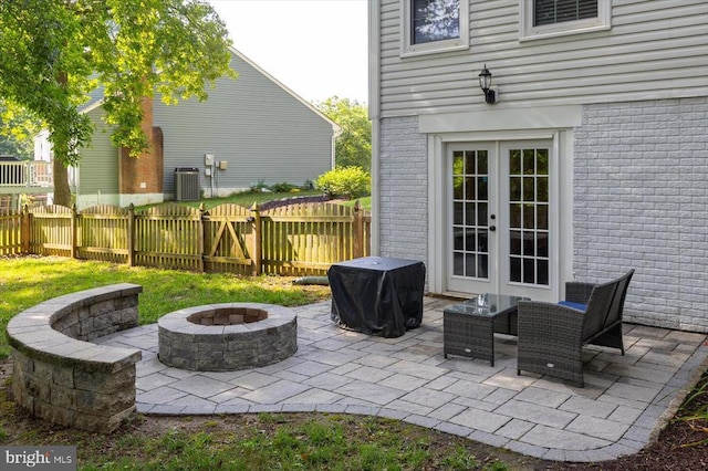 4924 Queensbury Cir, Fredericksburg, VA 22408 - view of patio / terrace with a fire pit, french doors, and a grill