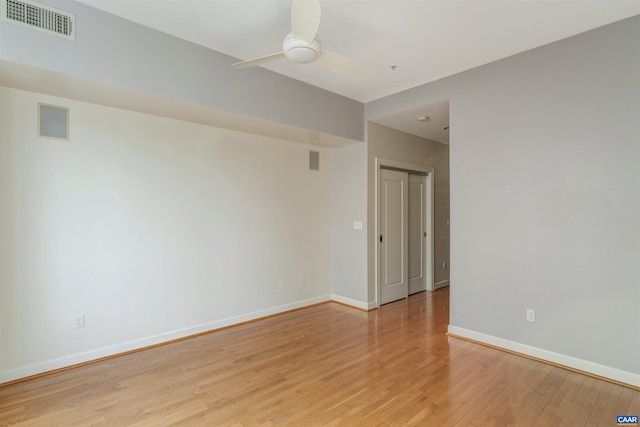 112 5th St SE Unit 3D, Charlottesville, VA 22902 - empty room with light wood-style flooring and a ceiling fan
