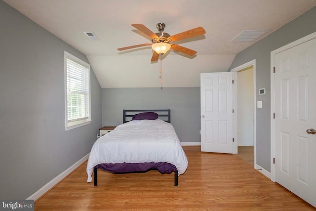 7204 Morris Rd, Spotsylvania, VA 22551 - bedroom featuring vaulted ceiling, light wood finished floors, baseboards, and a ceiling fan