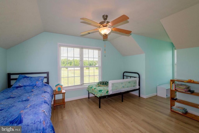 7204 Morris Rd, Spotsylvania, VA 22551 - bedroom featuring vaulted ceiling, wood finished floors, baseboards, and ceiling fan