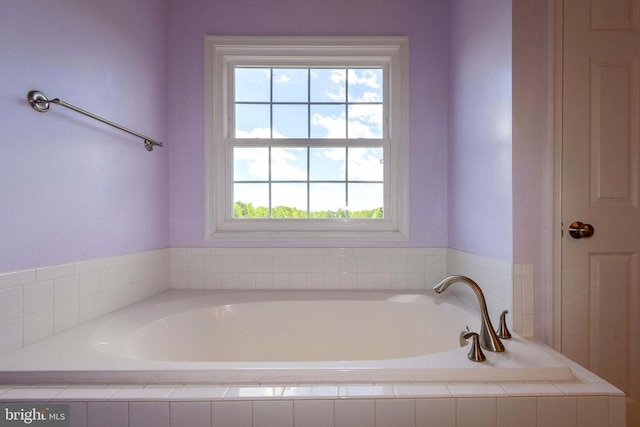 7204 Morris Rd, Spotsylvania, VA 22551 - bathroom featuring healthy amount of natural light and a bath