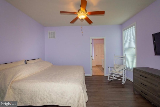 7204 Morris Rd, Spotsylvania, VA 22551 - bedroom featuring dark wood-style flooring, multiple windows, baseboards, and ceiling fan