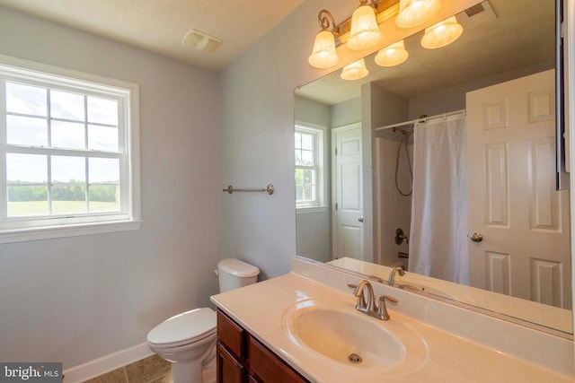 7204 Morris Rd, Spotsylvania, VA 22551 - full bathroom with toilet, vanity, baseboards, curtained shower, and tile patterned flooring