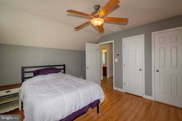 7204 Morris Rd, Spotsylvania, VA 22551 - bedroom with wood finished floors, vaulted ceiling, ceiling fan, and baseboards